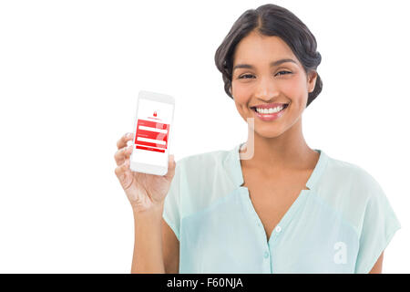 Composite image of businesswoman showing mobile phone over white backgroun Stock Photo