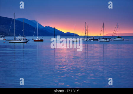 Sailing boats in harbour at sunset, Ushuaia, Tierra del Fuego, Argentina Stock Photo