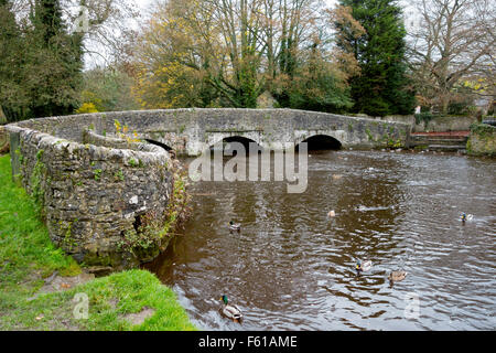 The 17th century sheepwash packhorse bridge across the River Wye, Ashford in the Water, Derbyshire Peak District, England UK Stock Photo