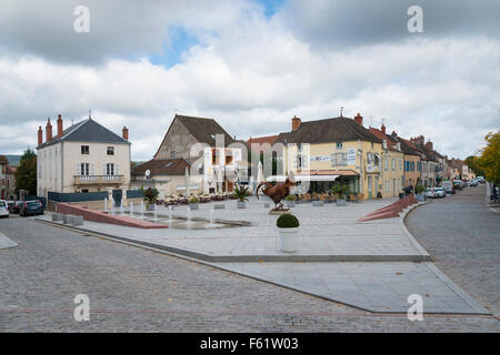 Shops and buildings in a street scene in the town of Chagny France Stock Photo