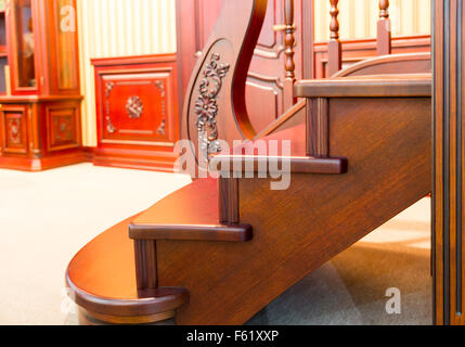 Modern staircase made from nice brown wood closeup Stock Photo