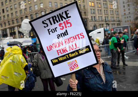 New York City, USA. 10th Nov, 2015. People attend the strike in support of a $15-per-hour minimum wage in New York City, the United States, Nov. 10, 2015. Hundreds of fast food workers took part in strike nationwide Tuesday, joining other workers in pressing for a more livable wage. Credit:  Wang Lei/Xinhua/Alamy Live News Stock Photo