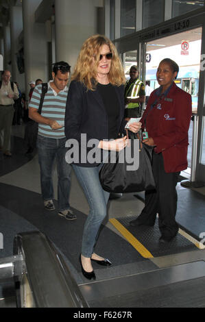Rene Russo departs from Los Angeles International Airport (LAX) with her husband Dan Gilroy  Featuring: Rene Russo Where: Los Angeles, California, United States When: 02 Oct 2015 Stock Photo