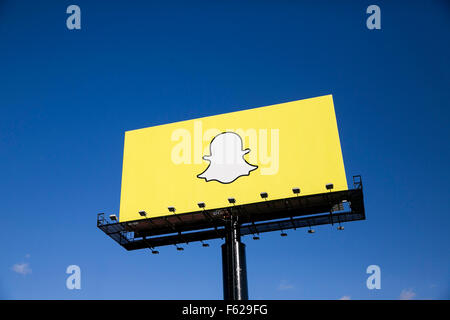 An advertising billboard featuring the Snapchat logo in Richfield, Minnesota on October 24, 2015. Stock Photo