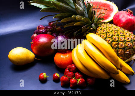 still life - various, assorted fruits on the black background still life - various, assorted fruits on the black background