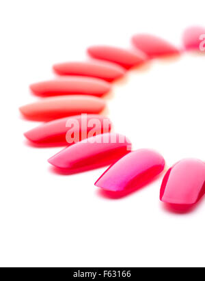 Closeup of red nail varnishes. Isolated on white Stock Photo