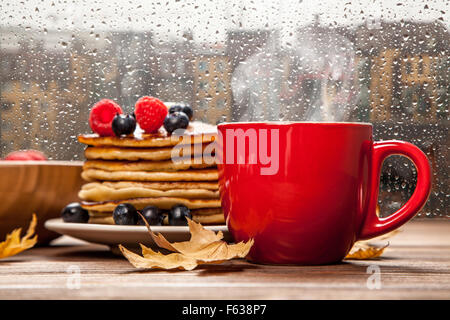 Cup of coffee and pancakes Stock Photo