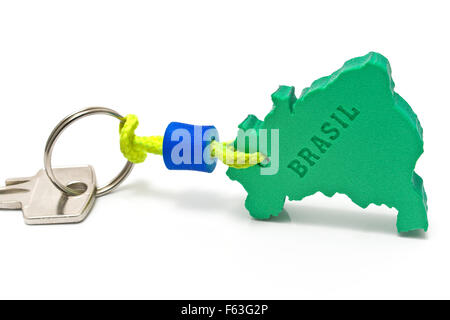 House key with tag in form of  Brazil border isolated on white Stock Photo