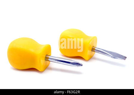 Two yellow short screwdrivers isolated on white Stock Photo