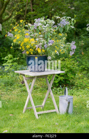 Spring with Syringa bouquet in garden Stock Photo