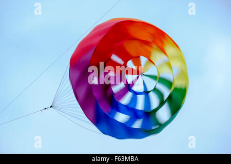 Colourful kite blowing in the wind Stock Photo