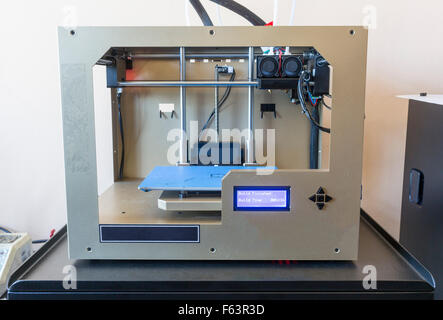 Electronic three dimensional (3D) plastic printer in a laboratory. Stock Photo