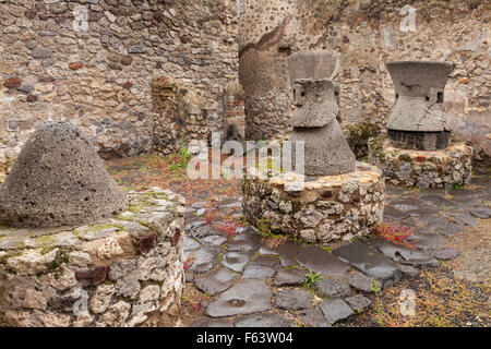 Panificio, the bakery and ovens in Vicolo Storto in the ancient Roman ruins of Pompeii, Italy Stock Photo