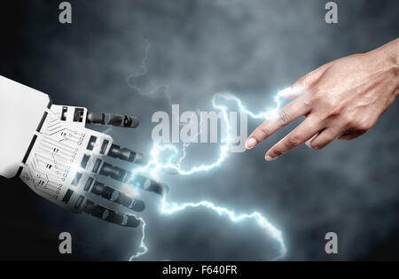 Robot and human connecting through electricity bolts Stock Photo