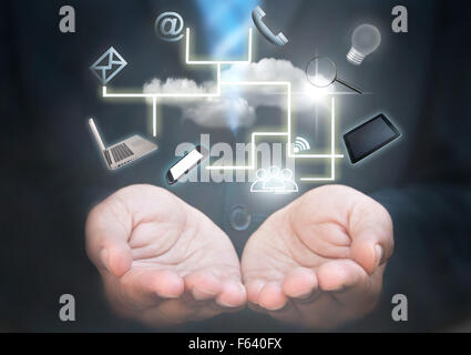 Business man holding a social media technology cloud Stock Photo