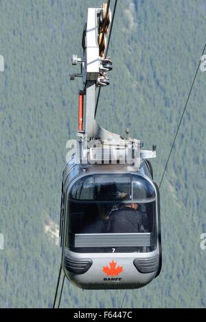 The Banff Gondola traveling up Sulphur Mountain in the Rocky Mountains of Alberta, Canada. Stock Photo