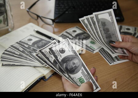 calculating home finances and domestic budget at table Stock Photo