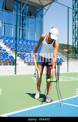 Young Woman Playing Tennis Stock Photo - Alamy