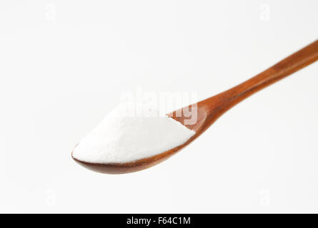 spoon of cooking soda on white background Stock Photo