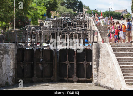 Boats wait at staircase of locks at Fonserannes locks,Beziers,South,France,coast,holiday,Canal,du,Midi,summer, Stock Photo