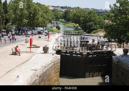 Boats wait at staircase of locks at Fonserannes locks,Beziers,South,France,coast,holiday,Canal,du,Midi,summer, Stock Photo