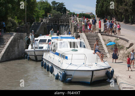 Boats wait at staircase of locks at Fonserannes locks,Beziers,South,France,coast,holiday,Canal,du,Midi,summer, Stock Photo
