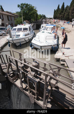 Boats wait at staircase of locks at Fonserannes locks,Beziers,South,France,coast,holiday,Canal,du,Midi,summer, Stock Photo