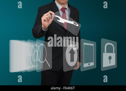 man select computer icon on touch screen panel Stock Photo