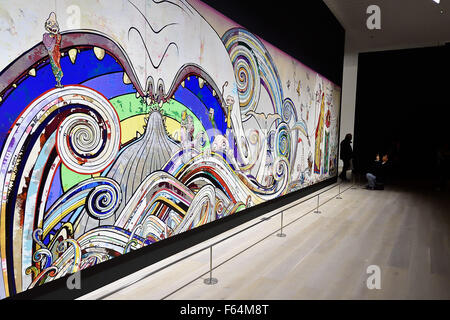 Tokyo, Japan. 11th Nov, 2015. Art patrons photograph the captivating art work of Japan's internationally acclaimed contemporary artist Takashi Murakami at the exhibition entitled Takashi Murakami: The 500 Arhats at the Mori Art Museum, Tokyo, Japan. Photography in the galleries of the exhibition Takashi Murakami: The 500 Arhats is permitted for private use and for sharing on social media websites. The exhibition at the Mori Art Museum runs from October 31, 2105 through March 6, 2016. © 2012 Takashi Murakami/Kaikai Kiki Co., Ltd. All Rights Reserved. © Rory Merry/ZUMA Wire/Alamy Live News Stock Photo