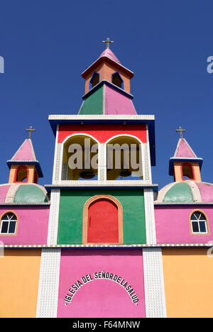 Brightly painted Mexican church at Herbolaria Beto Ramon, Aguacatitla, Axtla de Terrazas, San Luis Potosi state, Mexico Stock Photo