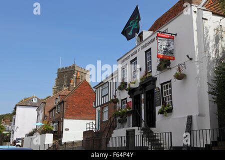 The historic Stag Inn flying the pirate flag, All Saints Street, Hastings, East Sussex, England, UK Stock Photo