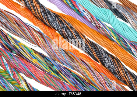 Multicolored telecommunication cables isolated on white background Stock Photo