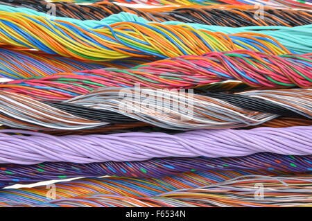 Multicolored telecommunication cables isolated on white background Stock Photo