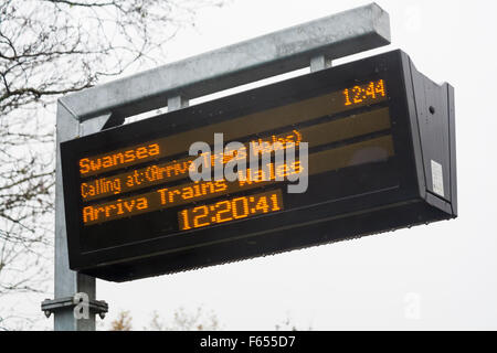 Electronic information board showing details of the next train due at Cynghordy train station, Carmarthenshire, Mid Wales UK in November Stock Photo