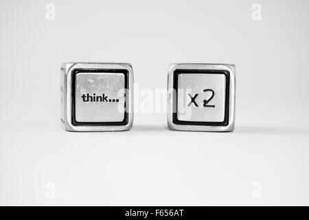 Two dices with messages on them Stock Photo