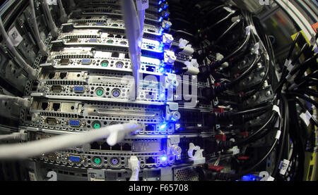 FILE - A file picture dated 01 July 2014 shows servers connected in the new German Telekom AG datacenter in Biere, Germany. The subsidiary of T-Systems opened the company's largest datacenter nationwide with 150,000 square meters of space on 03 July 2014. Microsoft will soon offer its cloud service customers the ability to save data in Germany. Photo: JENS WOLF/dpa Stock Photo