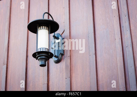 Lamp decorated on wooden wall, stock photo Stock Photo