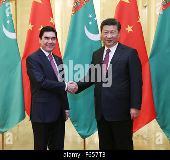 Beijing, China. 12th Nov, 2015. Chinese President Xi Jinping (R) shakes hands with Turkmenistan President Gurbanguly Berdymuhamedov in Beijing, capital of China, Nov. 12, 2015. © Liu Weibing/Xinhua/Alamy Live News Stock Photo