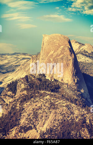 Old film retro toned Half Dome rock formation, Yosemite National Park, USA. Stock Photo