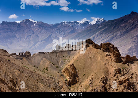 India, Himachal Pradesh, Spiti valley, Dhankar monastery on ridge and snow capped Himalayan peaks Stock Photo
