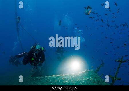 Diver at the MS Zenobia shipwreck. MS Zenobia was a Swedish built Challenger-class RO-RO ferry launched in 1979 that capsized an Stock Photo