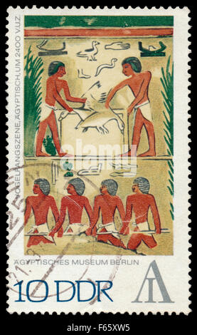 GERMANY - CIRCA 1972: Stamp printed in the East Germany shows Egyptian Museum Berlin - fowling scene, around 2400 BCE, circa 197 Stock Photo