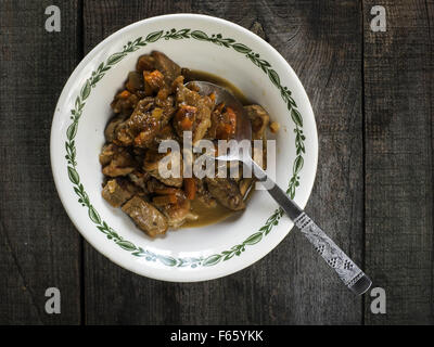 Nov. 4, 2015 - Pork Stew with Spicery in vintaje bowl on wooden weathering background © Igor Goiovniov/ZUMA Wire/Alamy Live News Stock Photo