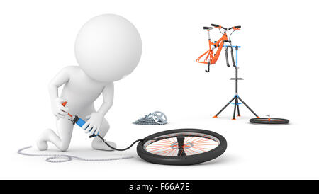 Cyclist inflates a tire Stock Photo
