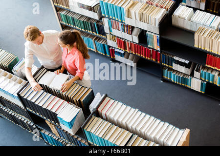 Students learning, reading in the library,view from above Stock Photo