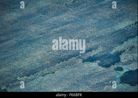 Stone grunge blue surface abstract, colored rock texture, flat wall background in horizontal orientation, nobody... Stock Photo