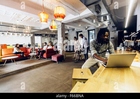 Modern cafe, dynamic life, people and diversity Stock Photo