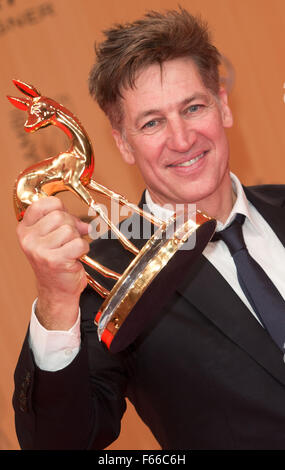 Berlin, Germany. 12th Nov, 2015. Actor Tobias Moretti receives the Bambi award in the 'national actor' category in Berlin, Germany, 12 November 2015. © dpa picture alliance/Alamy Live News Stock Photo