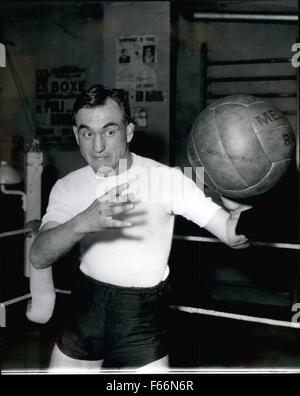 1958 - Some snappy work with the football is part of Charles Humez's training at this home in France.Humez of France prepares to meet Turpin: Charles Humez of France is now in strict training for his World Middleweight championship fight with British middleweight champion, Randolph Turpin which takes place at the White City on June 9th. Charles Humez lives at Henin Lietard, near Douni a coal mining district and Humez himself was formerly a miner. Turpin won his last fight when his opponent, Walter Cartier of New York was disqualified her holding. (Credit Image: © Keystone Pictures USA/ZUMAPRES Stock Photo