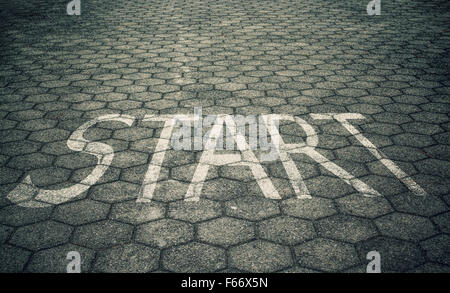 Start text on floor Stock Photo